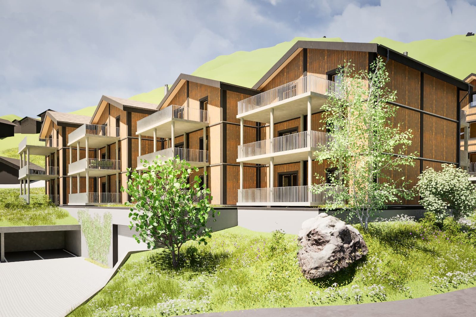 Mondhaus Resort Fiesch: Mehrfamilienhäuser von der Wiese aus